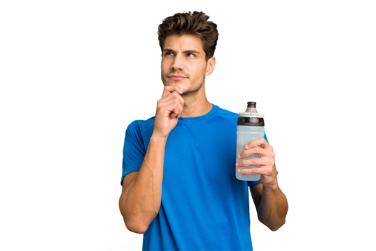 Young sport caucasian man holding a bottle of water isolated looking sideways with doubtful and skeptical expression.
