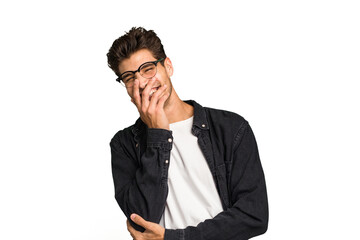Young caucasian handsome man isolated laughing happy, carefree, natural emotion.