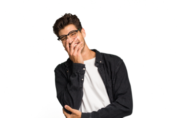 Young caucasian handsome man isolated laughing happy, carefree, natural emotion.