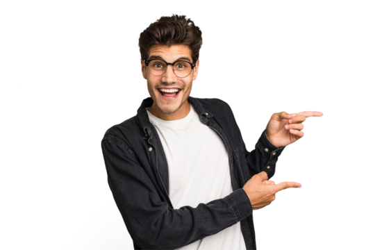 Young caucasian handsome man isolated excited pointing with forefingers away.