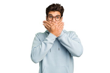 Young caucasian handsome man isolated shocked covering mouth with hands.