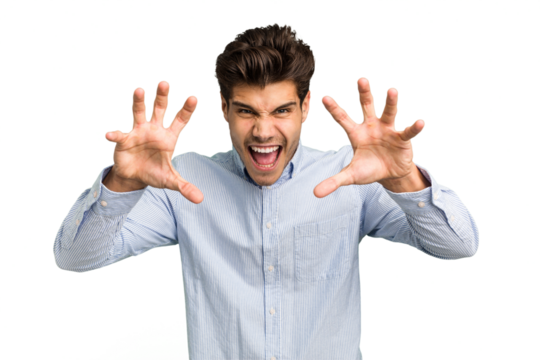 Young caucasian handsome man isolated showing claws imitating a cat, aggressive gesture.