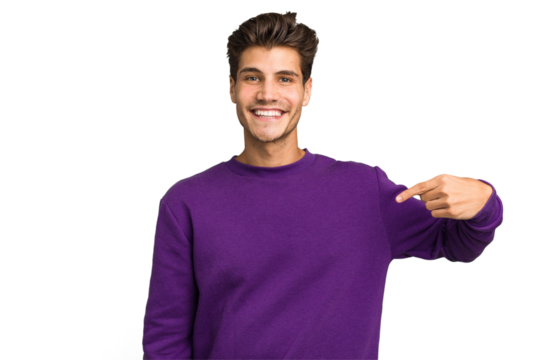 Young caucasian handsome man isolated person pointing by hand to a shirt copy space, proud and confident