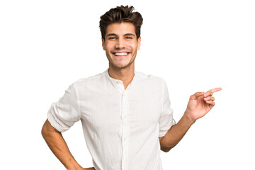 Young caucasian handsome man isolated smiling cheerfully pointing with forefinger away.