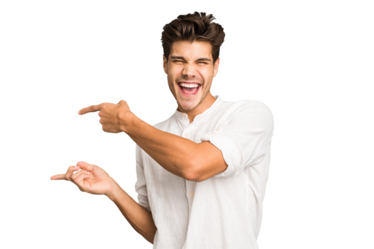 Young caucasian handsome man isolated excited pointing with forefingers away.