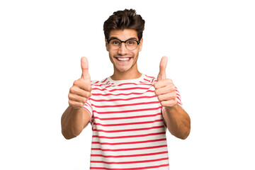 Young caucasian handsome man isolated smiling and raising thumb up