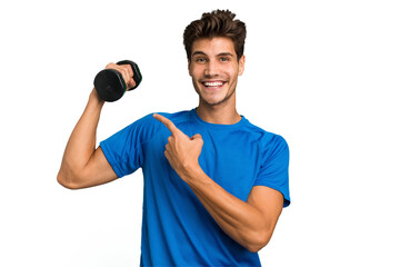 Young sport caucasian man training with weights isolated