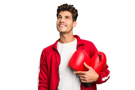 Young caucasian man practicing boxeo isolated