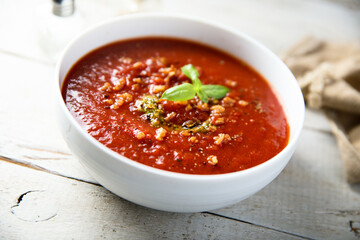 Tomato soup with pesto sauce