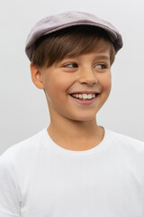 Portrait of smiling boy in a white t-shirt