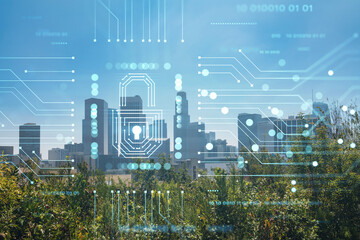 Los Angeles panorama skyline of downtown at day time, California, USA. Skyscrapers of LA city. Glowing Padlock hologram. The concept of cyber security to protect companies confidential information