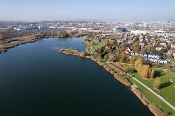 Aerial view - Bagry Lagoon, Podgórze XIII, Kraków, Poland - swimming spot in a city centre (kayak, sailing, sunbathing) Cracow must visit - obrazy, fototapety, plakaty