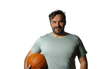 Basketball player holding a ball posing on a transparent background