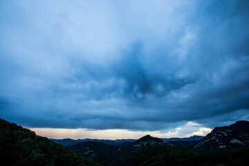 Sunset and dramatic clouds in La Garrotxa, Spain