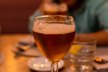 Fresh cold glass of light beer in restaurant