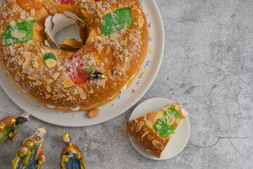 typical dessert of the day of kings in Spain, delicious and colorful With figurines of the Magi