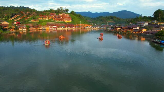 Drone is flying over a Chinese village in Thailand, &ldquo;Ban Rak Thai&rdquo; Lake early morning. Famous tourist attractions in Thailand. aerial view. Mae Hong Son, Northern Thailand. Southeast asia. 4K
