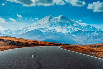 The road leading up to the mountain. Beautiful mountain scenery. Road close-up. The road to Elbrus, Kabardino-Balkaria, Russia.