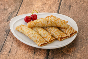 Sweet and tasty pancake with cherry