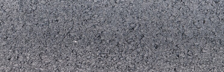 Rough asphalt surface, asphalt dark gray grain road, Lights texture, Top view