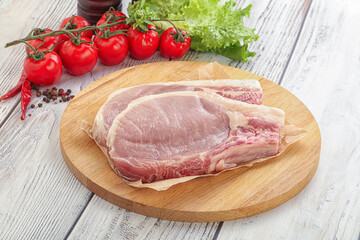Raw pork t-bone steak for grill