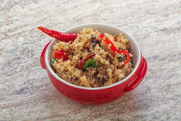 Arabic cous cous with meat and tomato