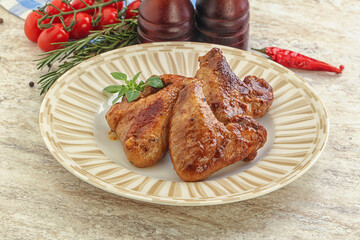 Roasted chicken wings with spicy sauce