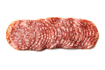Thin sliced salami sausage isolated on white. Thin sliced italian dry salame, top view
