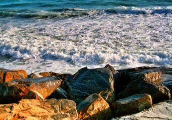 Waves splashing the rocks of the beach