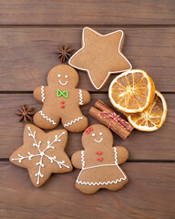 Traditional christmas gingerbread cookies over a wooden table