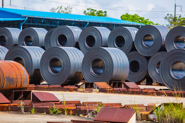 Rolls of carbon steel sheets outside the factory