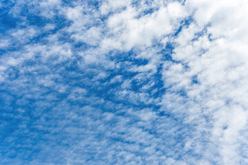 Clouds on blue sky background.