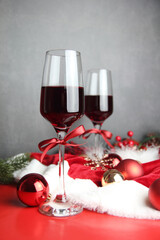 Christmas event party wine glass red gold ornament background