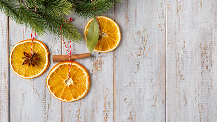 Christmas tree decoration made of natural materials. Handmade Christmas ornaments,  dried orange...