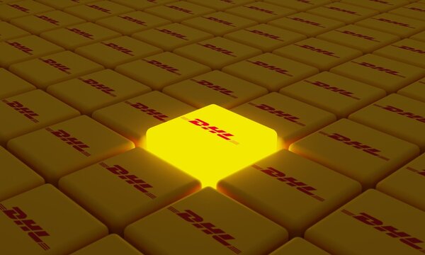 Melitopol, Ukraine - November 21, 2022: DHL logo icon isolated on shape of cubes. DHL German multinational company, one of the world leaders in the logistics market, the company was founded in 1969