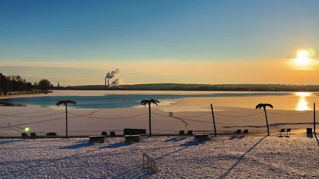 View of the tall chimneys of an industrial enterprise with a chimney polluting the atmosphere. The plant for the production of strategic intercontinental missiles "Topol-M". Russia, Votkinsk 2022
