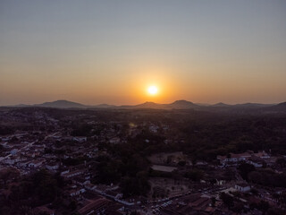 beautiful sunset in historic Portuguese colonial town surrounded by mountains