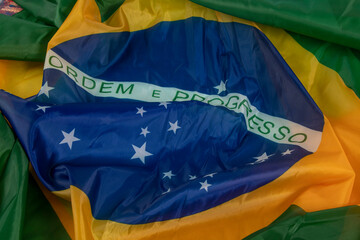 flag of Brazil in a wave like wind and filling the frame