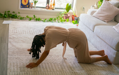 Young woman stretching and using movement meditation