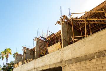 Construction site with scaffolding on the waterfront in  La Paz, Baja de California Sur, Mexico. 