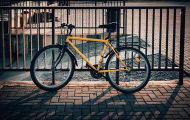 Fototapeta na wymiar Bike parking at iron fence.