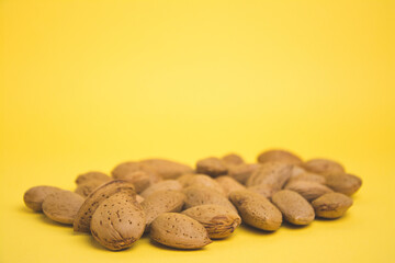 almonds on a yellow background