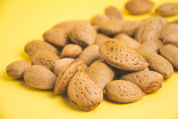 almonds on a yellow background
