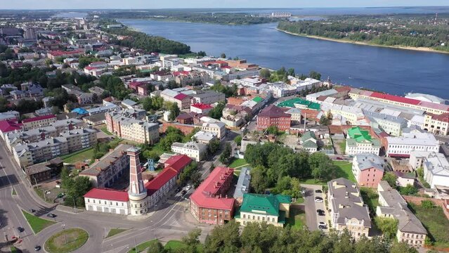 Aerial view of the administrative center of the city of Rybinsk with the Transfiguration Cathedral, as well as the original road bridge over the Volga River on a summer day, Russia.