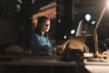 Business woman, in office at night and use tablet with computer planning, thinking and working on...