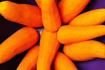 peeled a few carrots in a deep bowl close-up