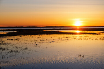 Fototapeta na wymiar Sunset view at a lake