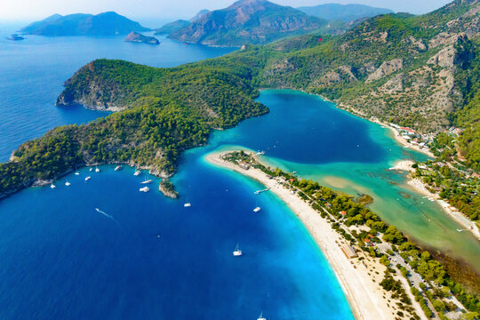 Aerial view of anchored boats and lagoon beach in Oludeniz, Fethiye, Turkey.