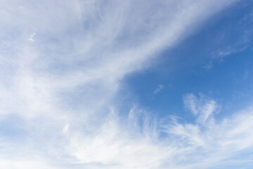 white clouds in sky , form beautiful  natural pattern that is suitable , for use as background