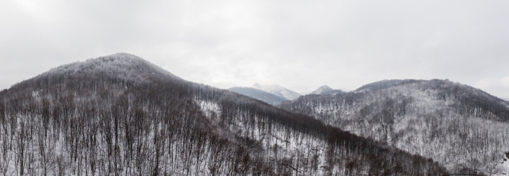 Panoramic aerial view of Zumberal mountain range cover by snow, Croatia.